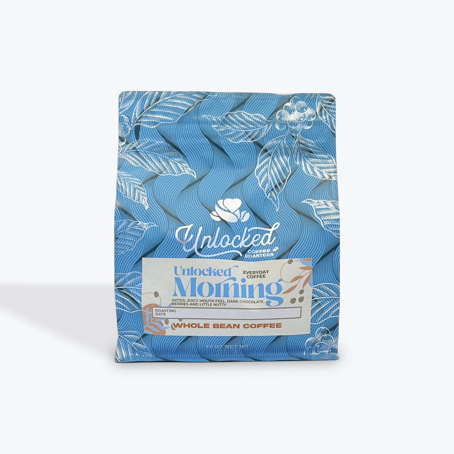 Best whole bean Everyday Morning coffee online features small batch freshness from Unlocked Coffee Roasters, with a juicy mouthfeel, dark chocolate, berries, and nutty notes; packaged in a Blue airtight bag, resting on a white background; as seen at BlazeMtn.com - the best of the Carolinas. 